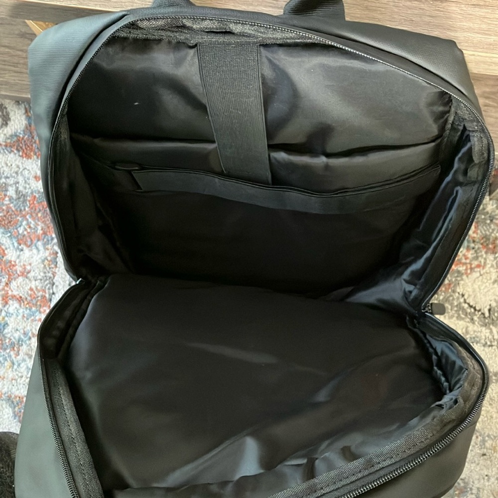 Black Modern Minimalist Backpack with Geometric Design
New without tag - Picture 3 of 3